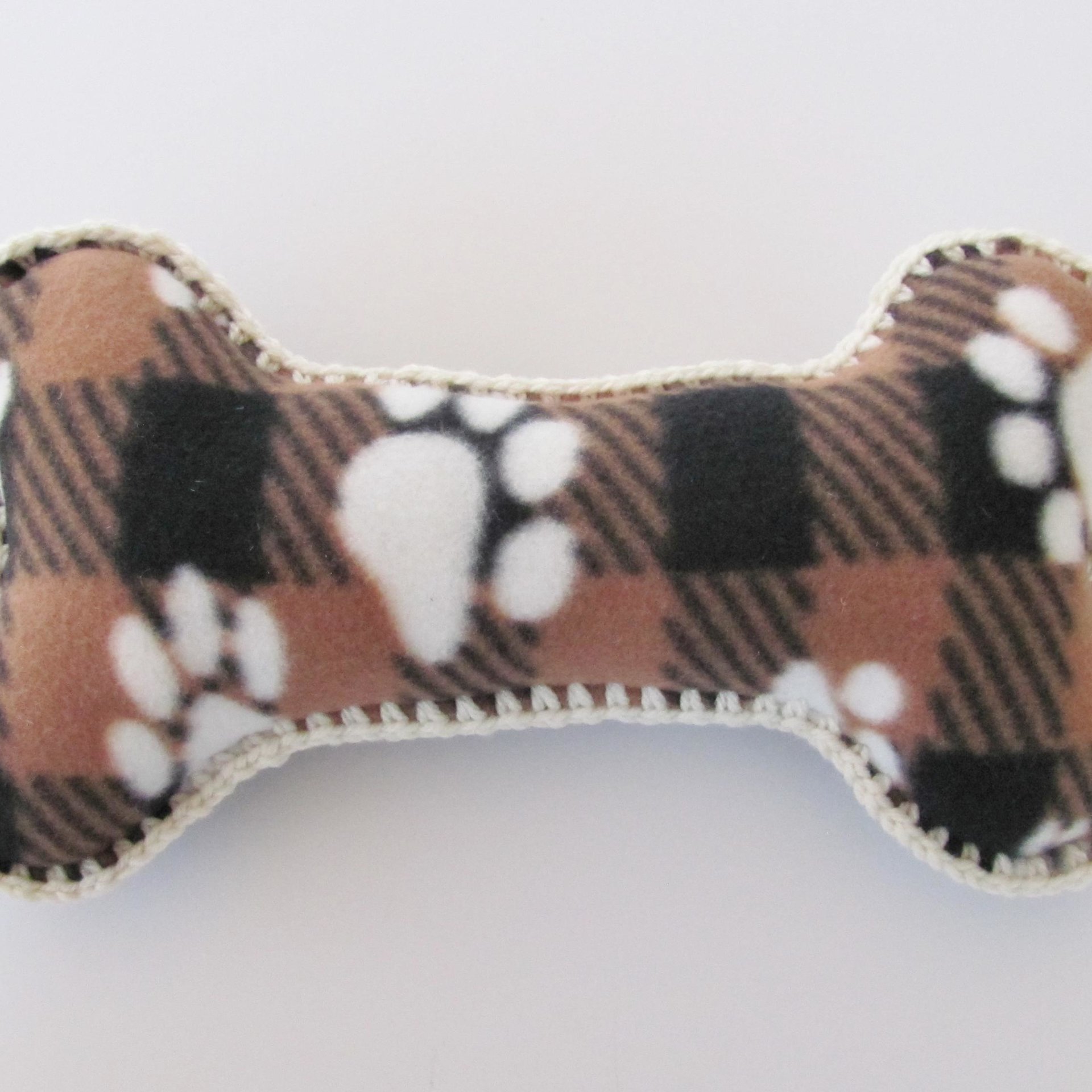 Fleece Paw Print Dog Bone Pillow with Decorative Crochet Trim, Made in USA