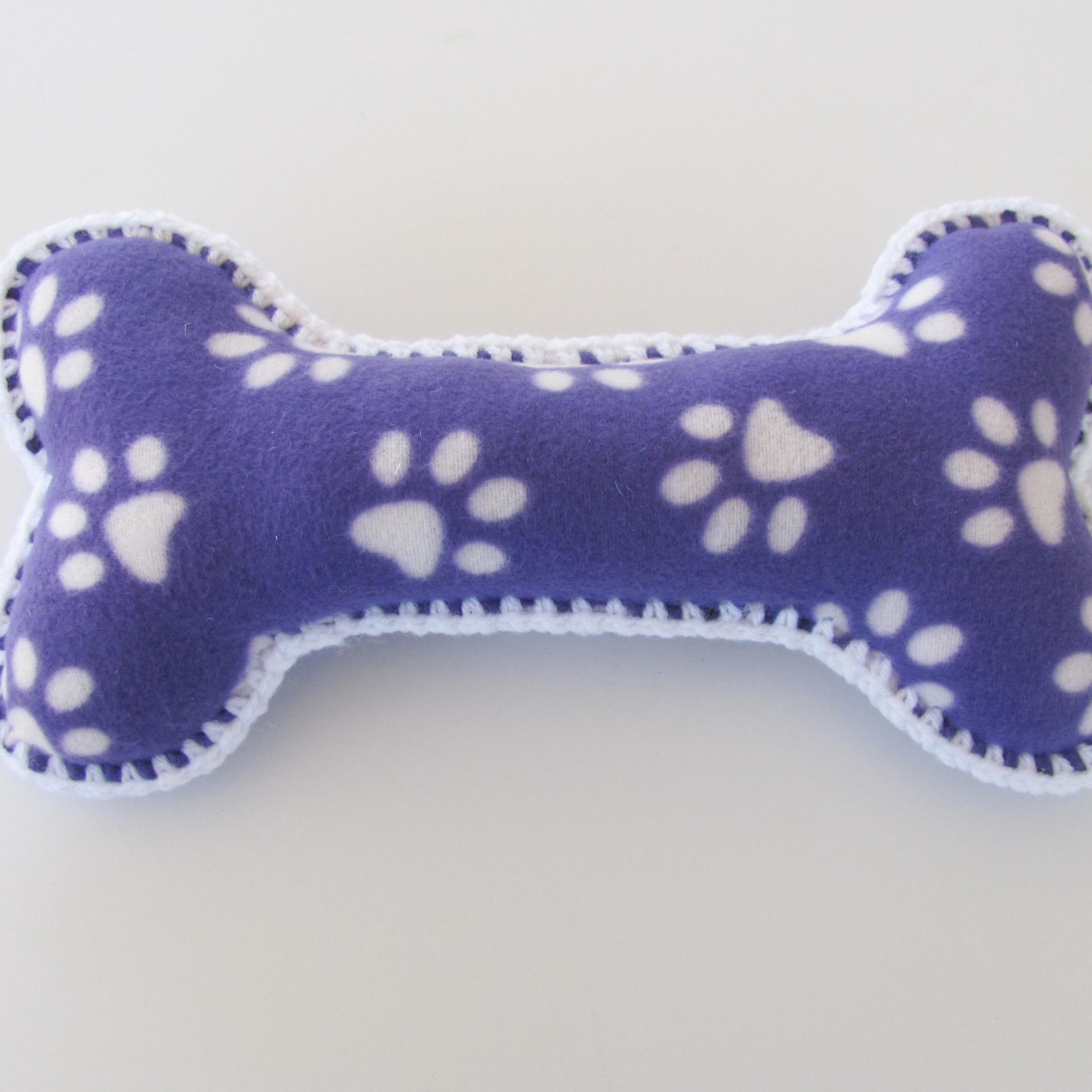 Purple Paw Print Dog Bone Shaped Pillow with Crochet Trim, Made in USA